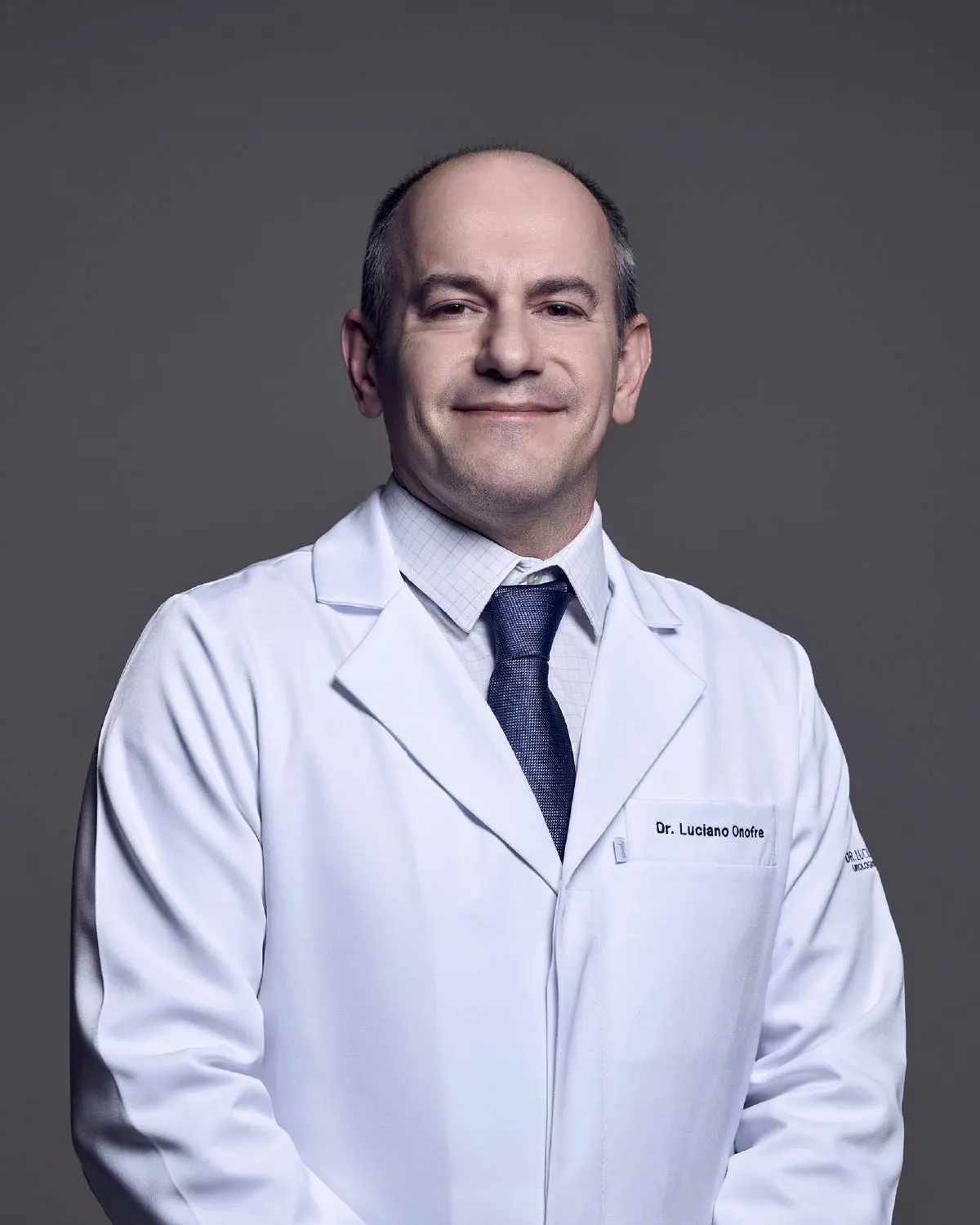 Retrato profissional do Dr. Luciano Onofre.